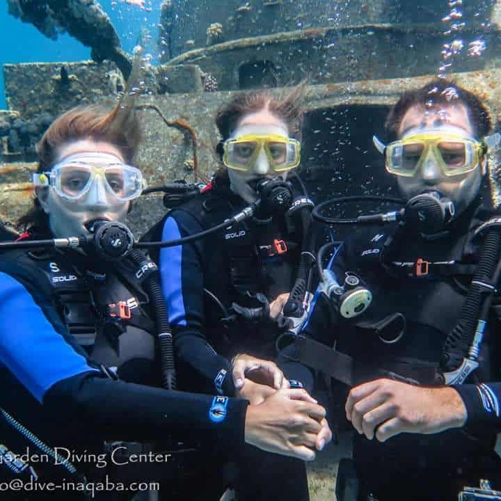 friends take photo underwater