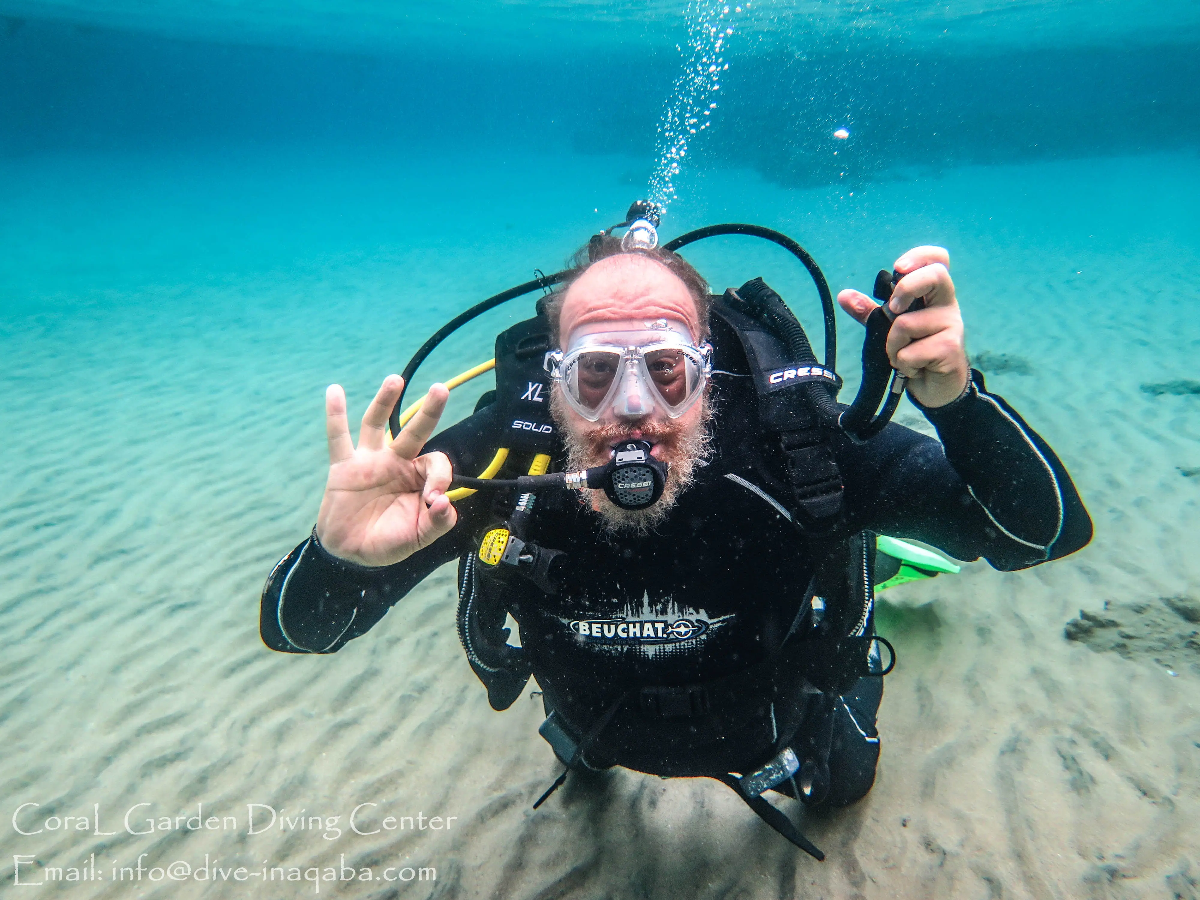 old man Dive Man dive in shallow water